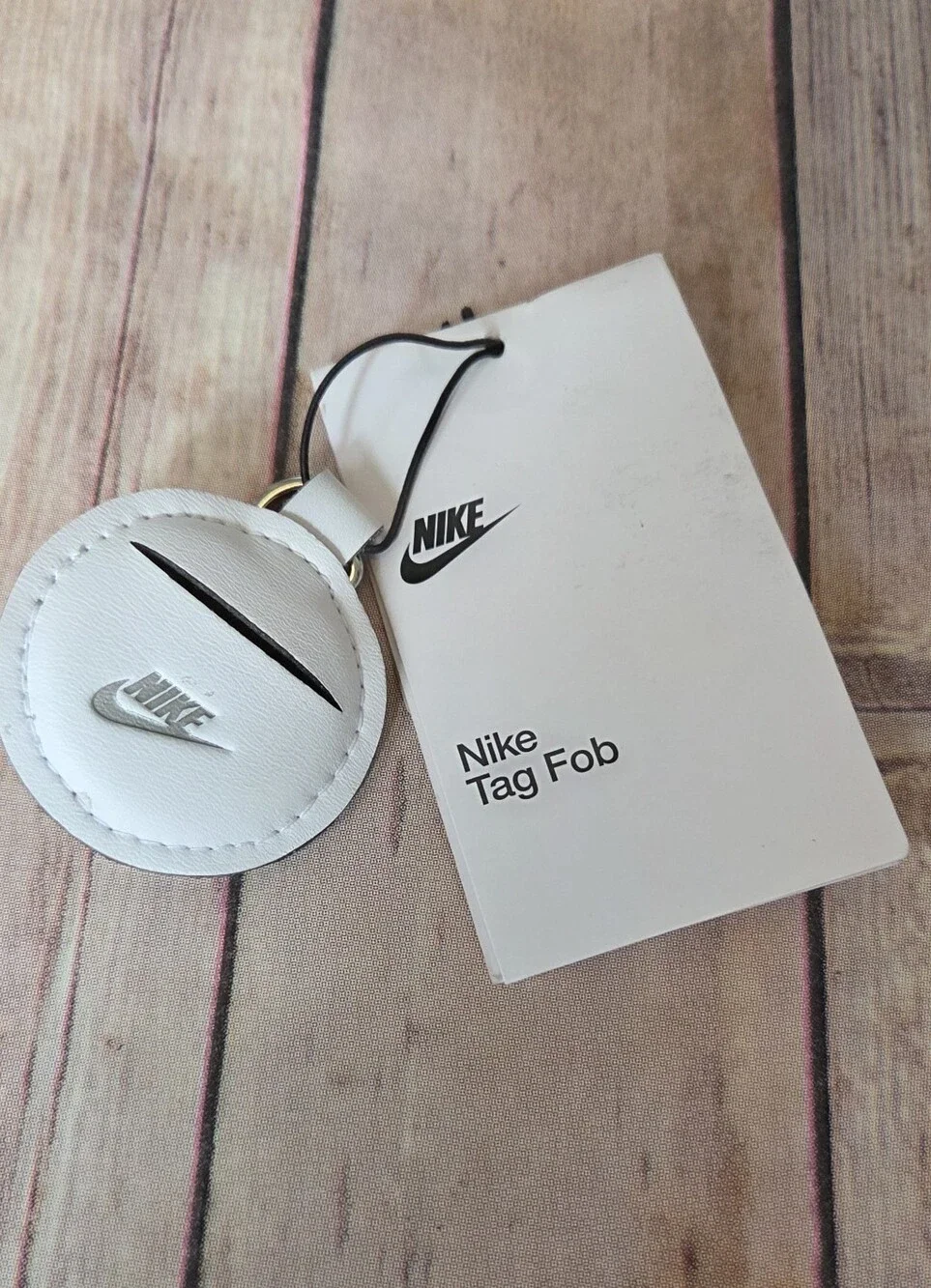 Nike Unisex Leather Circle Tag Fob with Silver Swoosh NWT